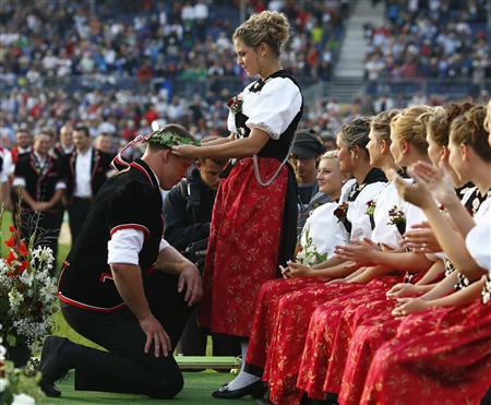 Swiss Alpine wrestler Sempach is crowned after winning the Federal Alpine Wrestling Festival in Burgdorf